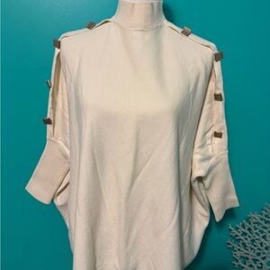 Elegant Cream Sweater with Gold Tone Button Accents